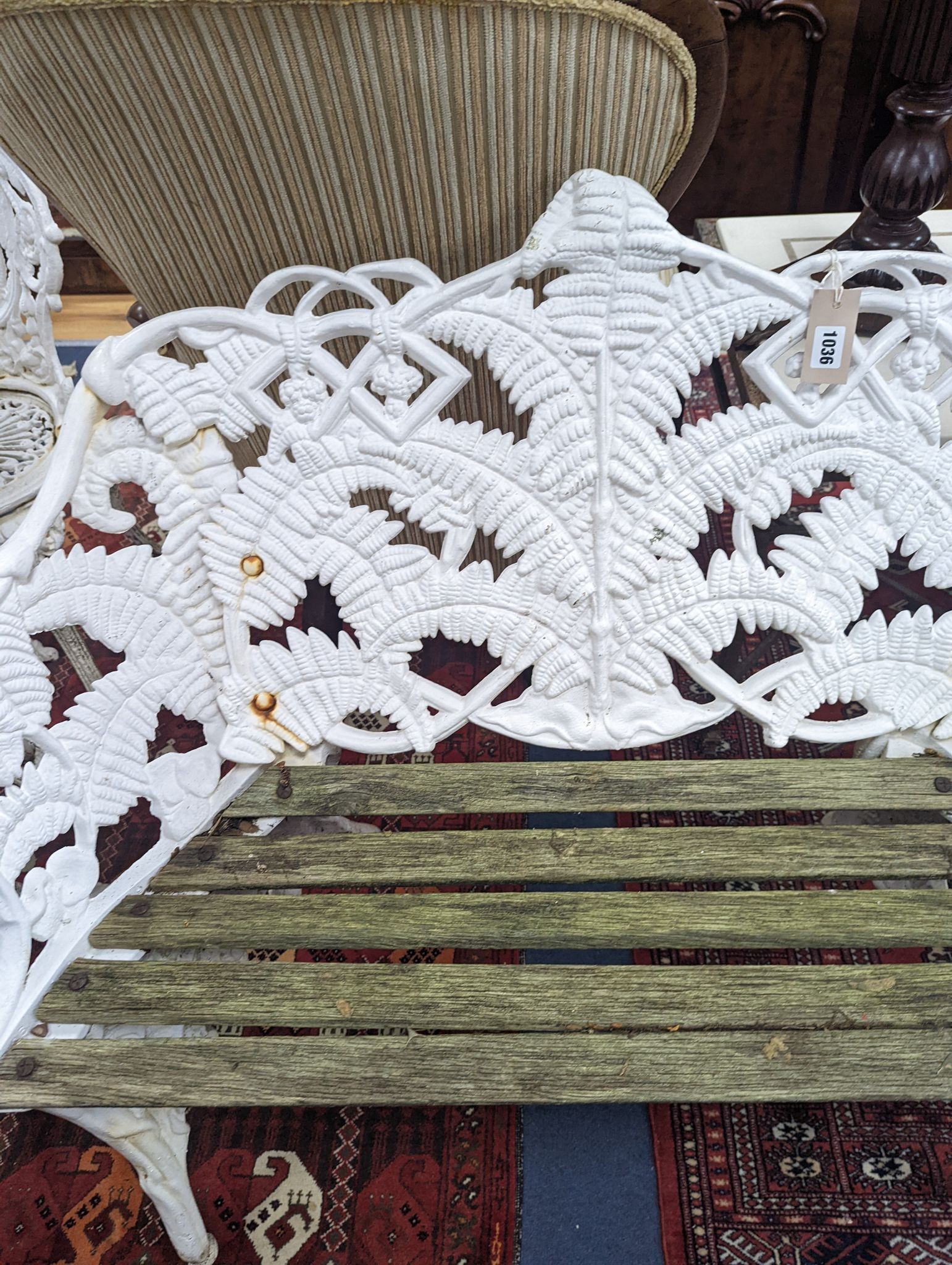 A Victorian Coalbrookdale design painted cast iron fern pattern garden bench, length 114cm, depth 44cm, height 90cm